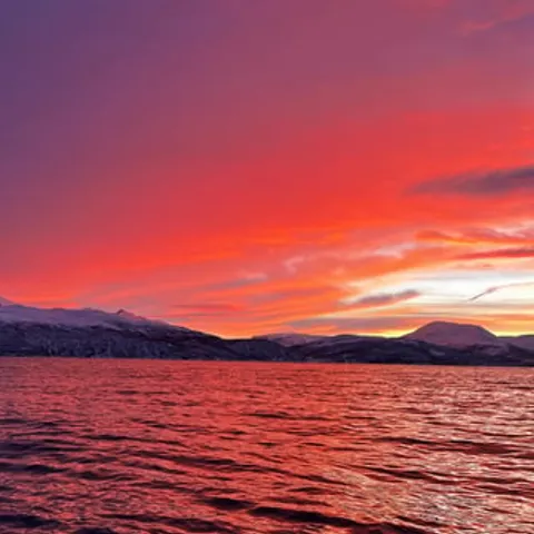 A winter sunset over the fjord near Skjervøy